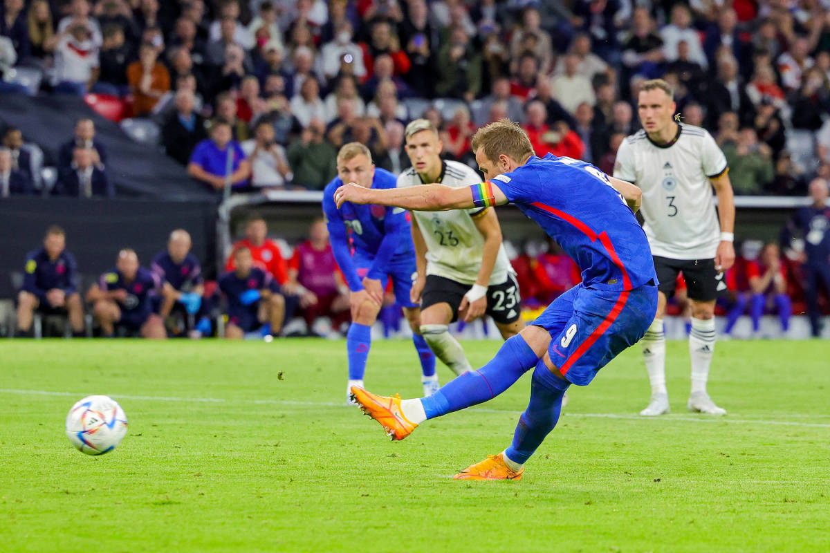 Harry Kane pictured scoring his 50th goal for England by converting a penalty kick in their 1-1 draw against Germany on June 7, 2022