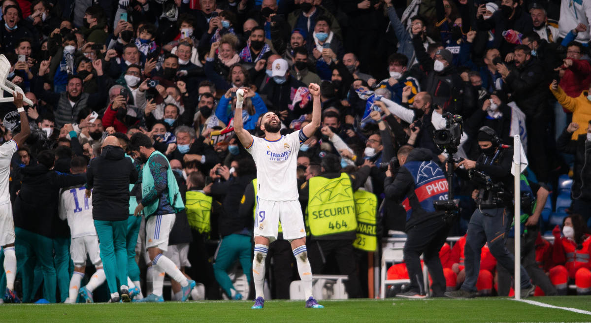 Karim Benzema celebrates scoring the winning goal for Real Madrid in their Champions League last 16 clash with PSG