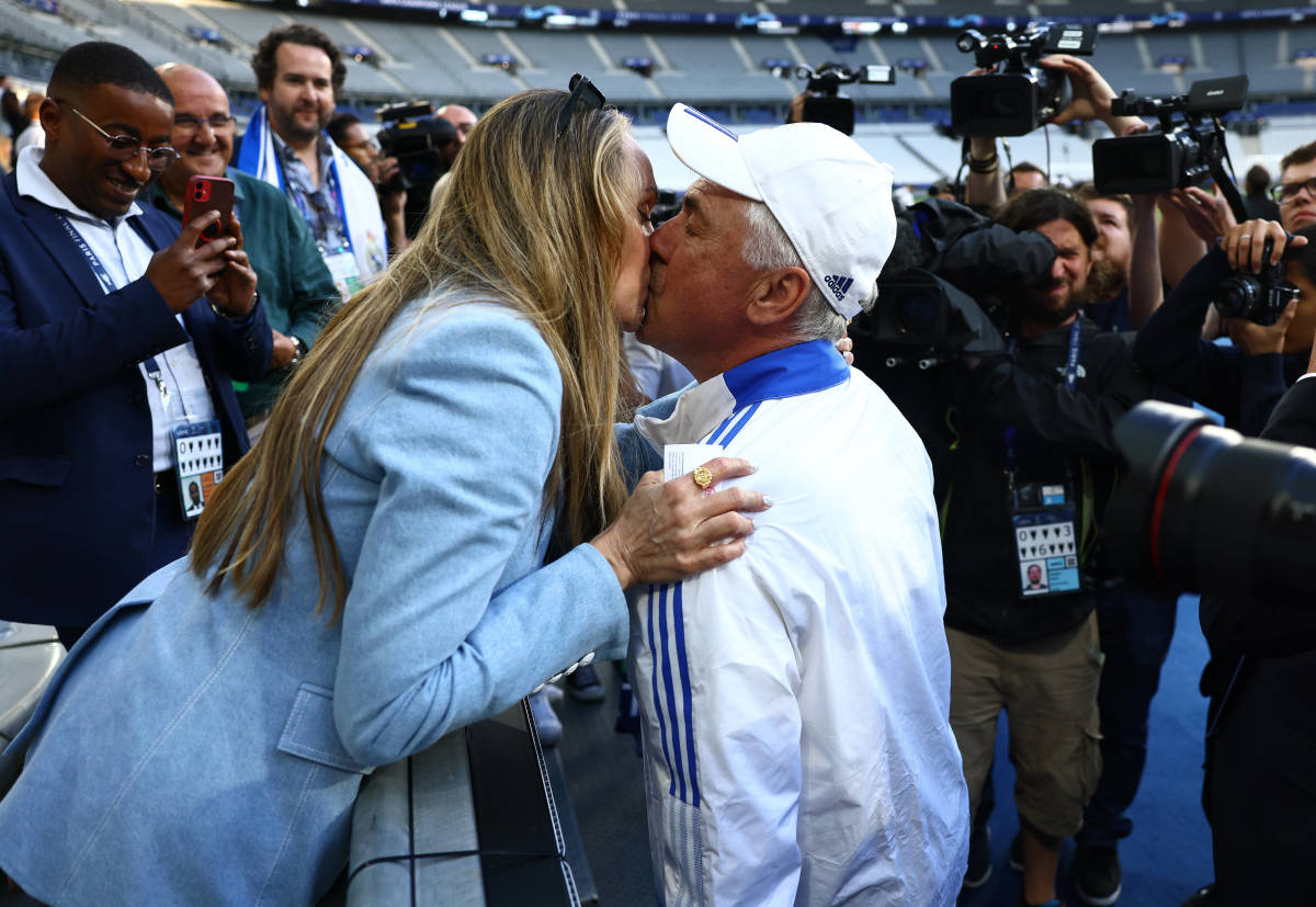 Real Madrid manager Carlo Ancelotti pictured kissing his wife Mariann Barrena McClay at the Stade de France on the eve of the 2022 Champions League final