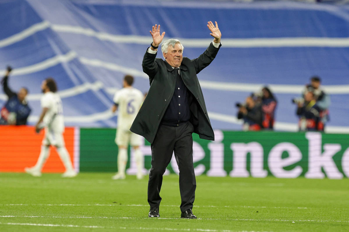 Carlo Ancelotti waves to Real Madrid's fans after his side beat Manchester City in their 2021/22 Champions League semi-final