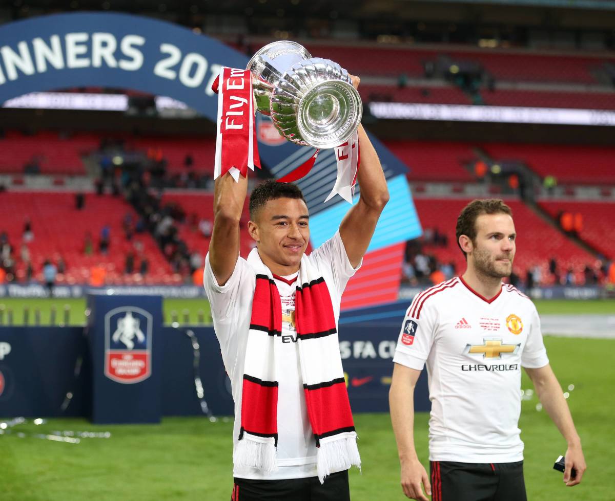 Jesse Lingard pictured lifting the FA Cup in 2016 after scoring Manchester United's winning goal against Crystal Palace in the final