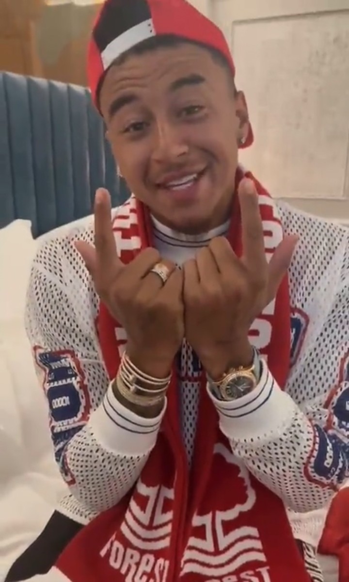 Jesse Lingard pictured wearing a Nottingham Forest scarf as he announces his transfer to the club in July 2022