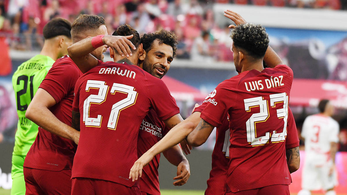 No.27 Darwin Nunez pictured hugging Mo Salah during Liverpool's 5-0 win over RB Leipzig in July 2022