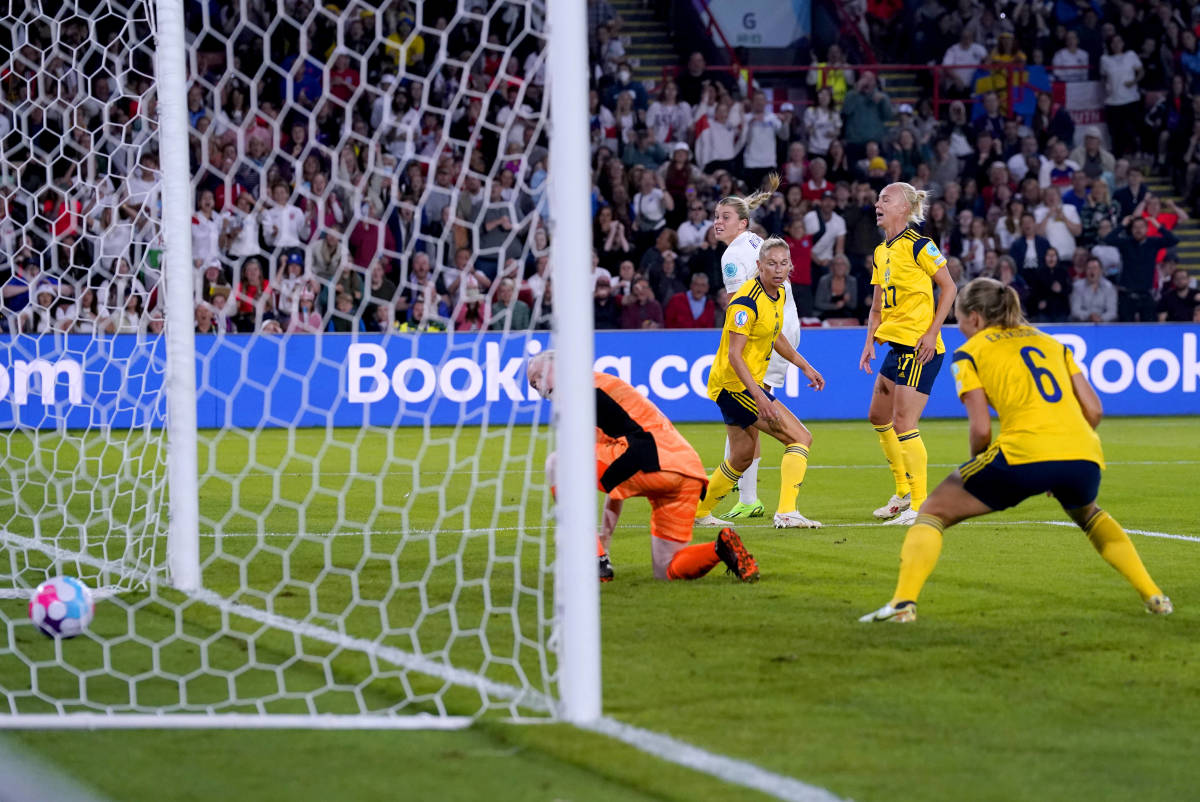 England's Alessia Russo pictured watching on as her back-heeled shot rolls into the Sweden net for a brilliant goal at Euro 2022