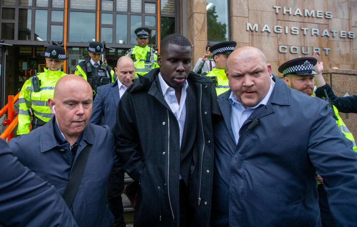 Kurt Zouma pictured (center) leaving Thames Magistrates Court on June 1, 2022 after being sentenced to 180 hours of community service for cat abuse