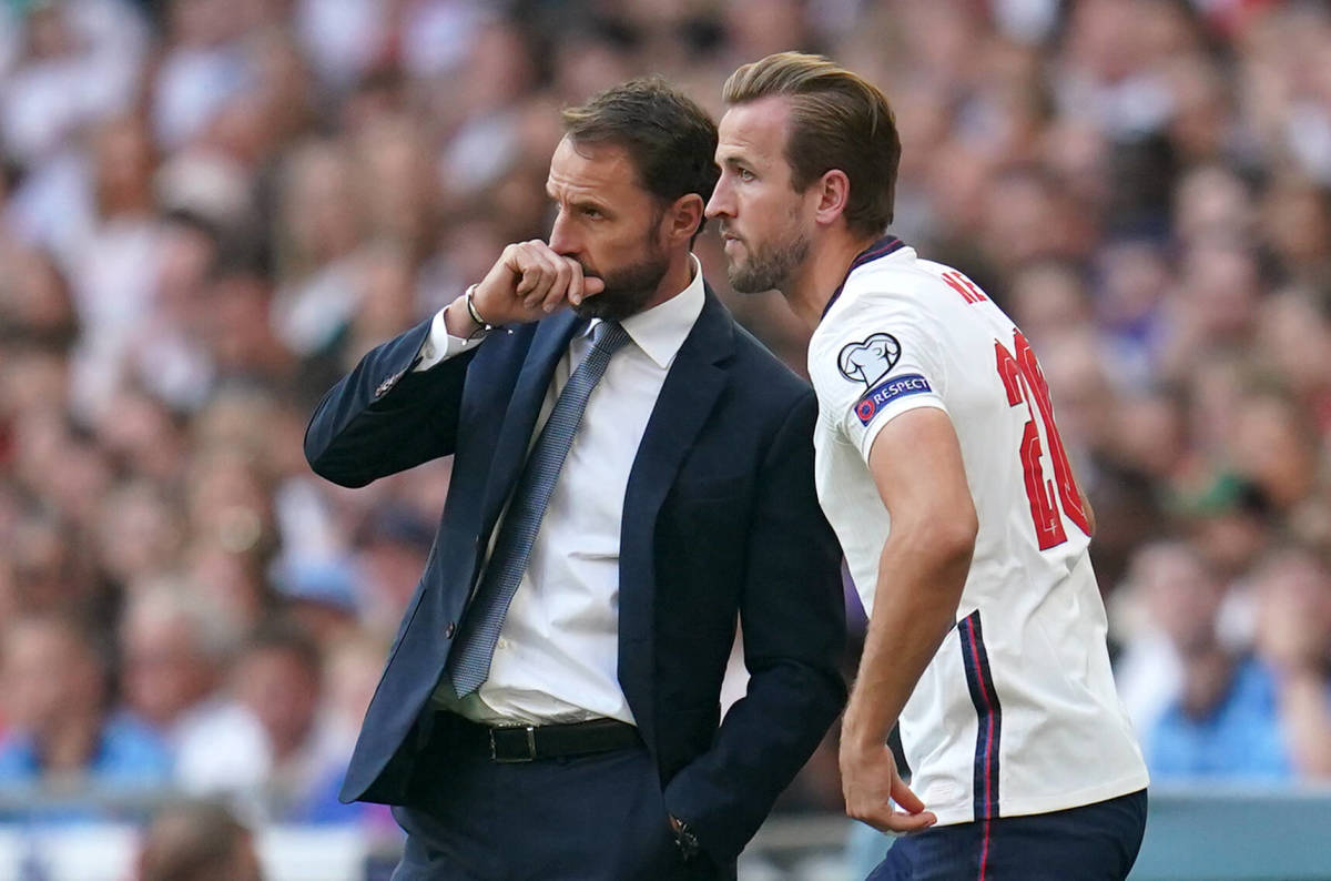 Gareth Southgate (left) pictured in conversation with Harry Kane during England's 4-0 win over Andorra in September 2021