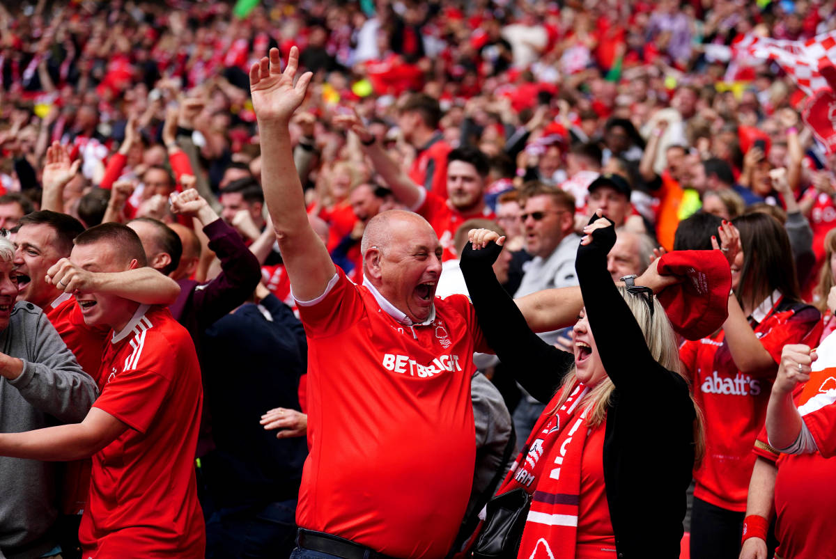 Nottingham Forest fans pictured celebrating at Wembley during their team's victory over Huddersfield Town in the 2022 Championship play-off final