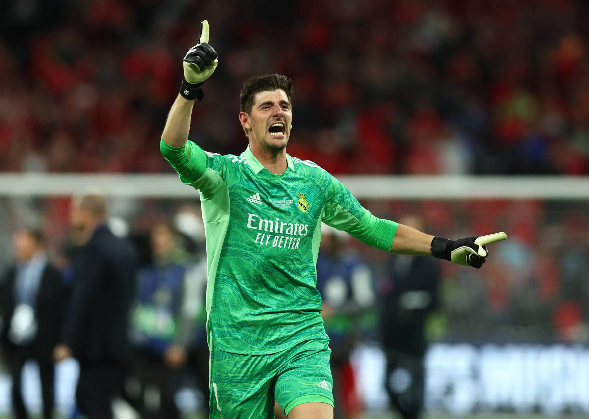Thibaut Courtois pictured celebrating after helping Real Madrid beat Liverpool in the 2022 Champions League final