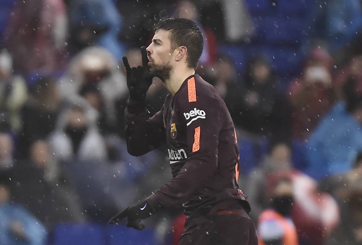 Gerard Pique puts his finger to his lips after scoring for Barcelona at Espanyol in 2018