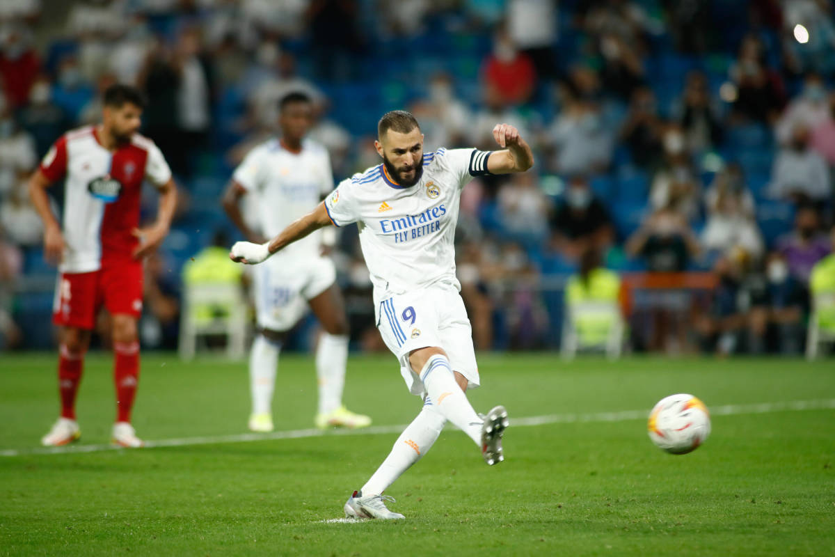 Karim Benzema scores a penalty for Real Madrid against Celta Vigo in 2021