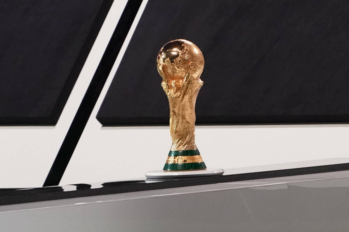 The World Cup trophy is pictured on display at a FIFA congress in March 2022