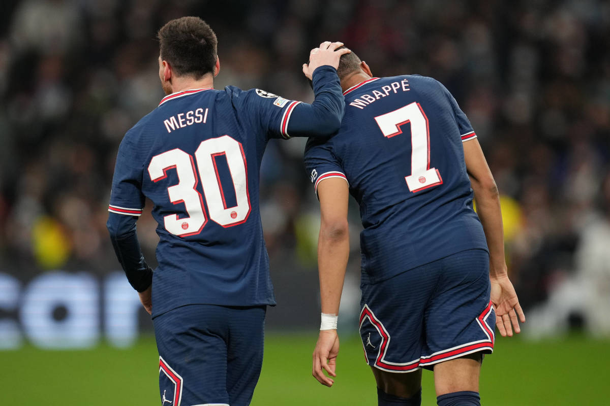 Lionel Messi congratulates Kylian Mbappe after the Frenchman's goal for PSG at Real Madrid