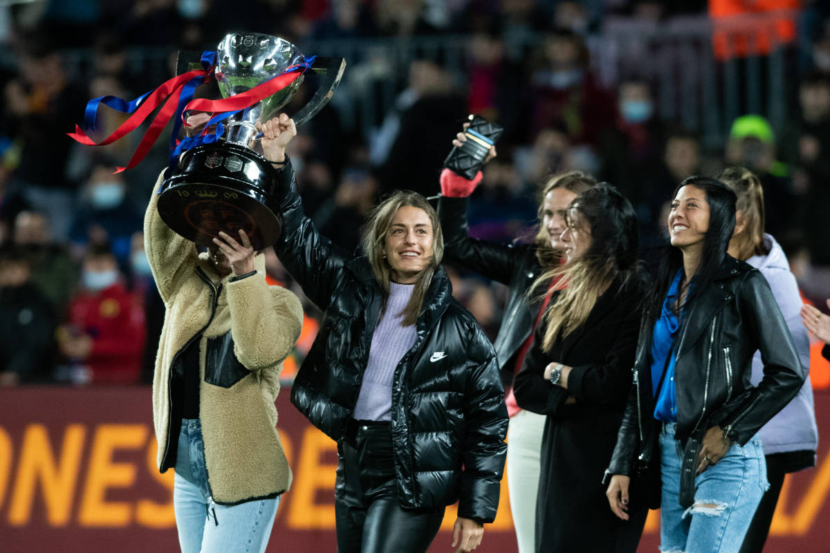 Alexia Putellas holds aloft Barcelona Women's La Liga trophy after inspiring her side to beat Real Madrid 5-0 in El Clasico