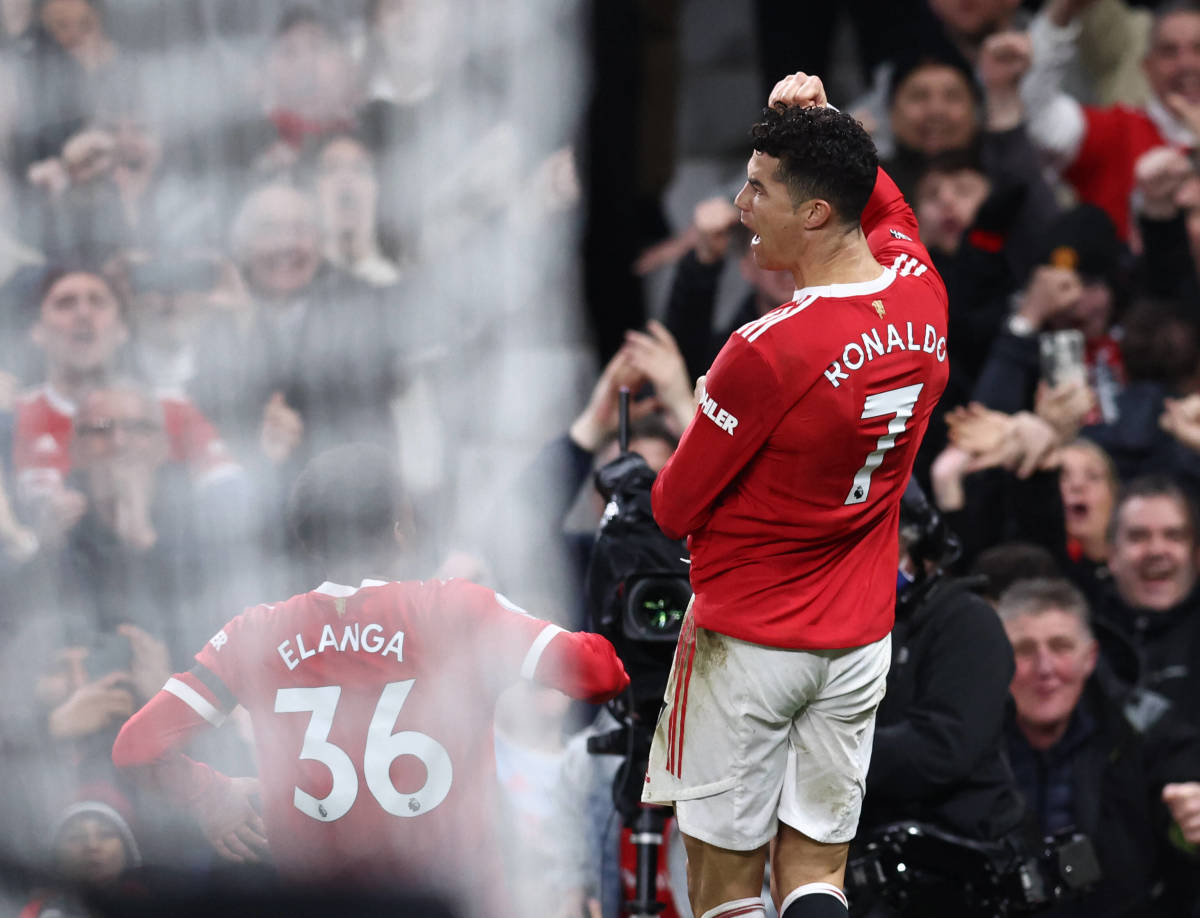 Cristiano Ronaldo celebrates after scoring his third goal of the game in Man United's 3-2 win over Spurs