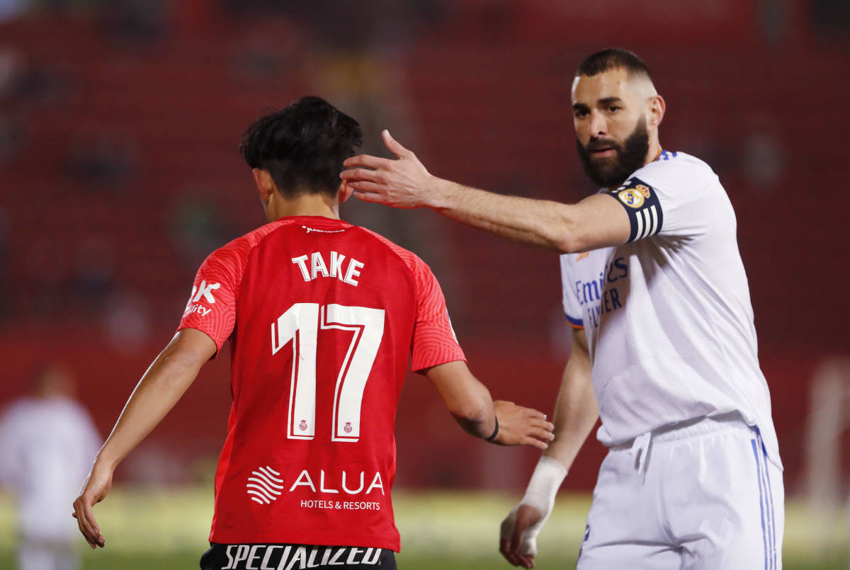 Karim Benzema and Take Kubo shake hands after Real Madrid's 3-0 win over Mallorca in March 2022