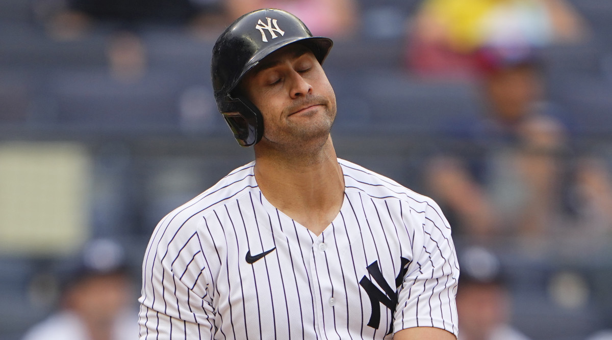 Joey Gallo winces after striking out for the Yankees.