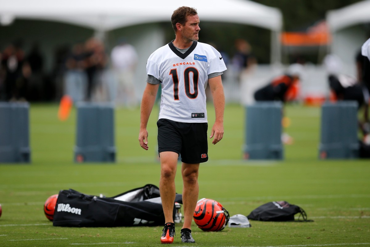 Cincinnati Bengals punter Kevin Huber (10) gets loose before practice during the first day of preseason training camp at the Paul Brown Stadium training facility in downtown Cincinnati on Wednesday, July 27, 2022. Cincinnati Bengals Training Camp