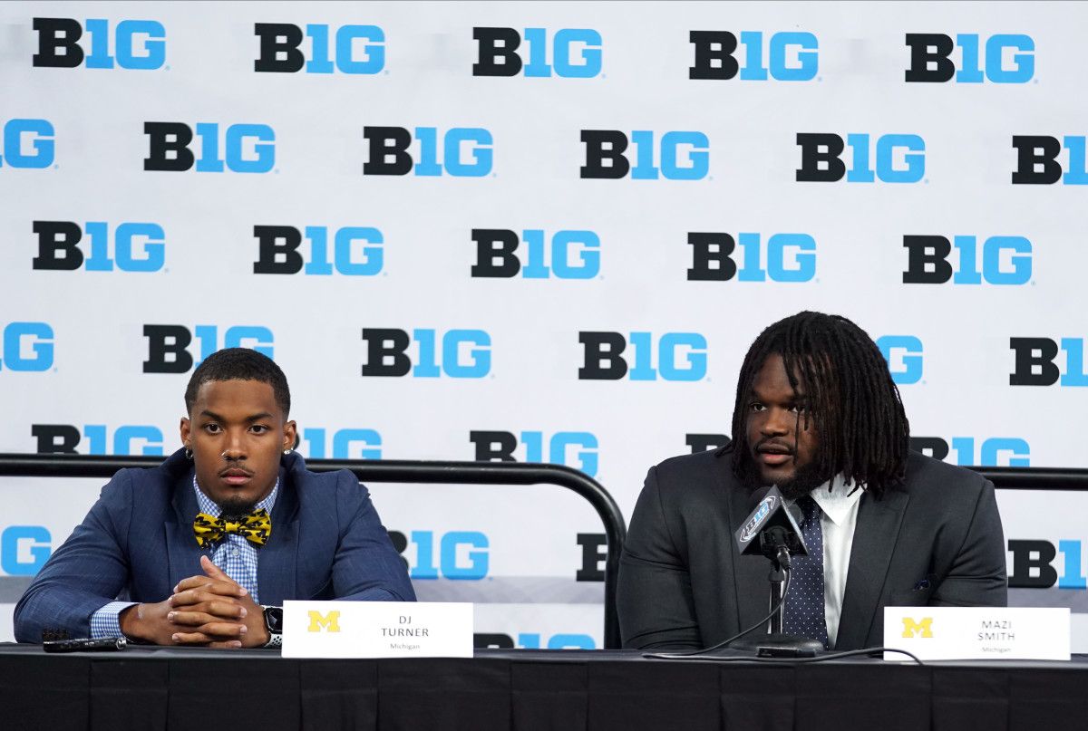 Michigan Wolverines defensive back DJ Turner and defensive tackle Mazi Smith