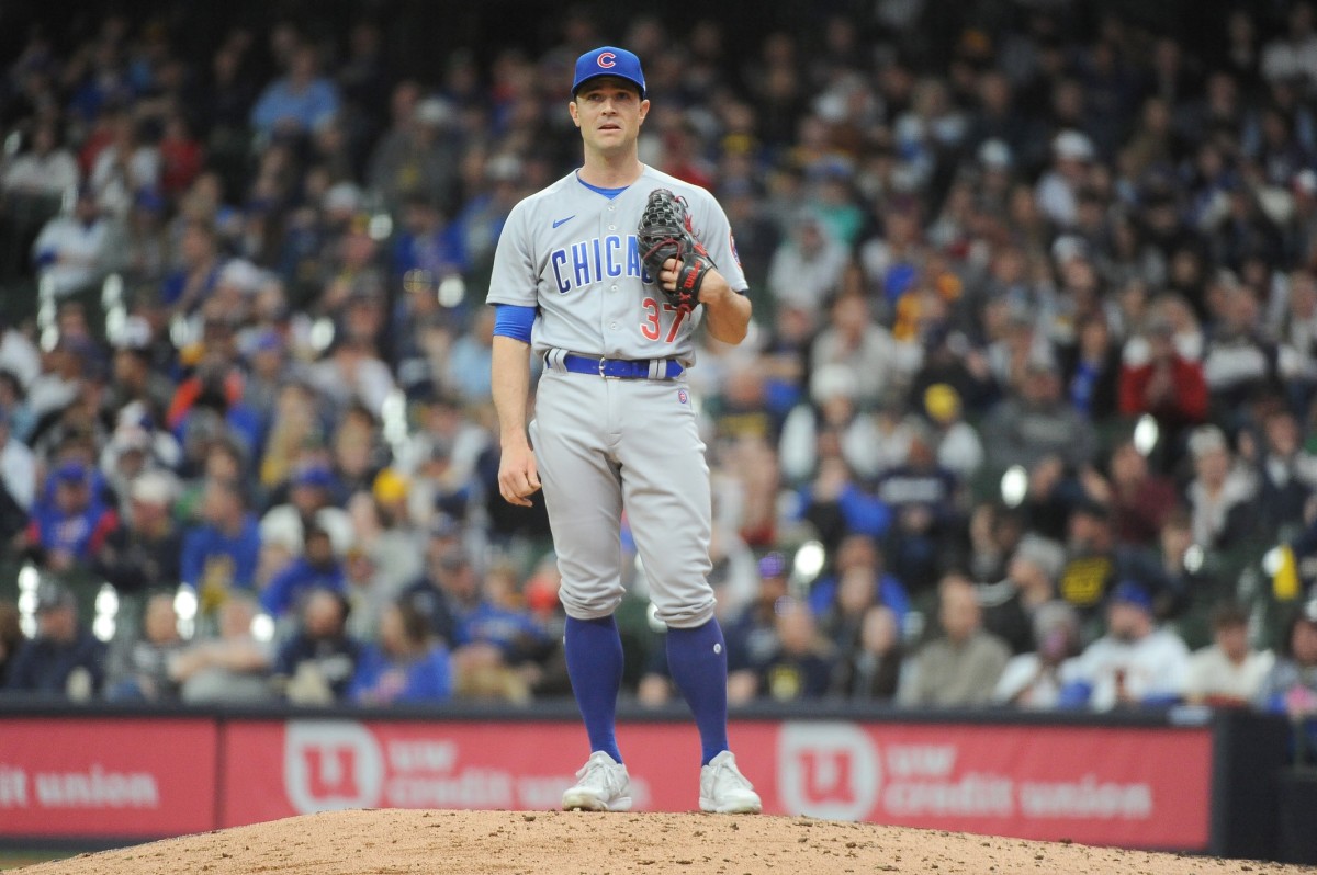 Chicago Cubs reliever David Robertson stands on mound