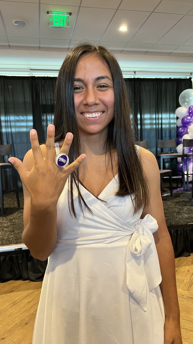 TCU Soccer's Oli Pena shows off her 2021 championship ring at the first-ever Kick-off Party.