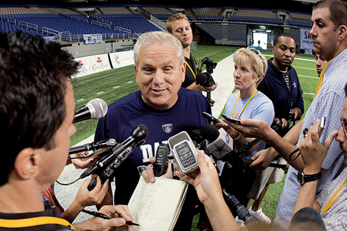 Dallas Cowboys coach Dave Campo is interviewed by members of the media during training camp at the Alamodome.