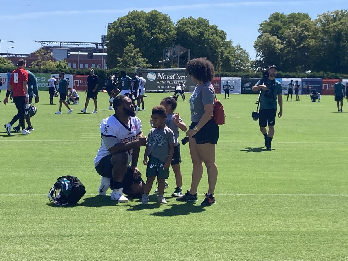 Brandon Graham with his family after practice on July 30, 2022