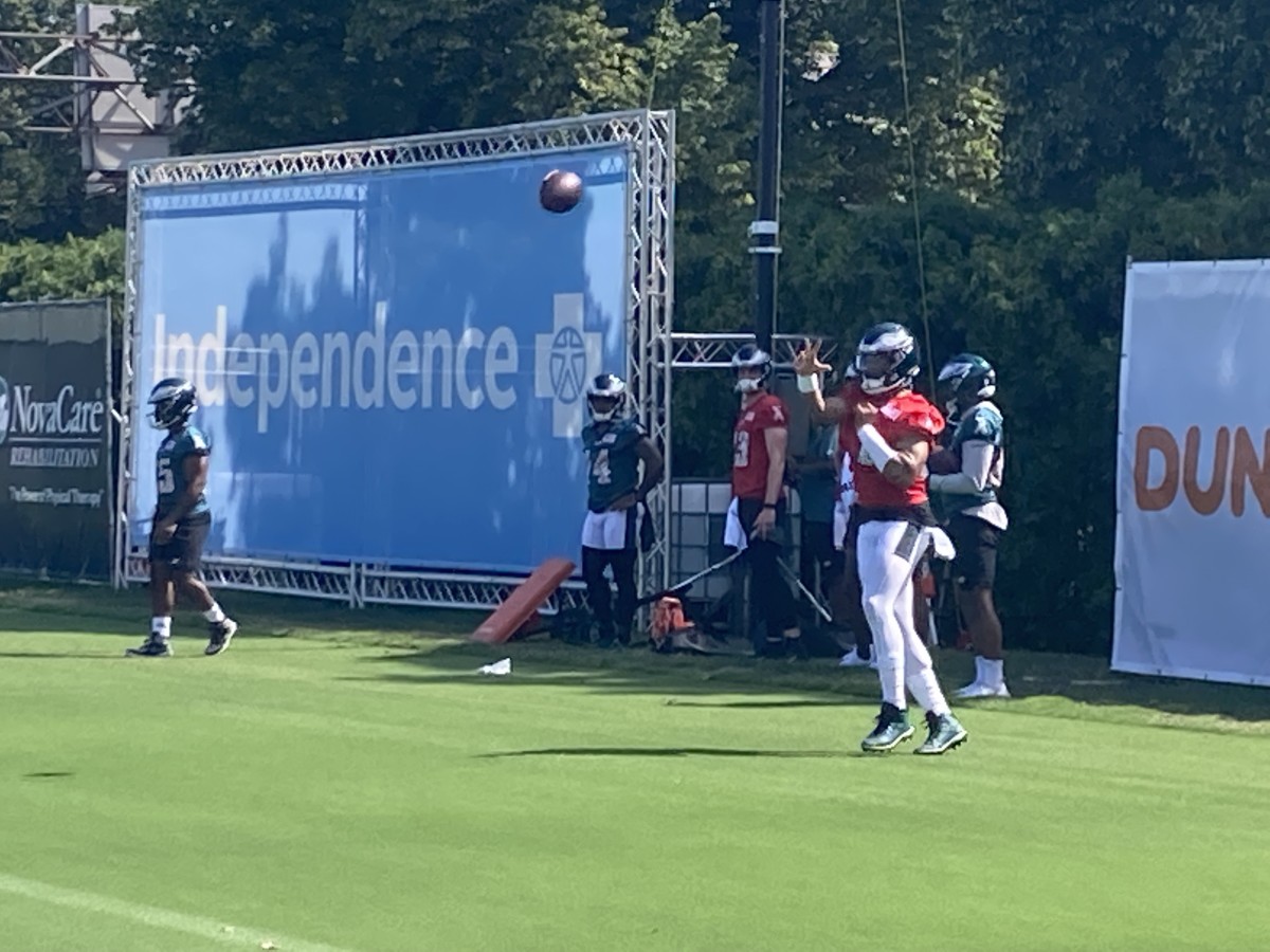 Jalen Hurts delivers a throw during a drill on July 30, 2022