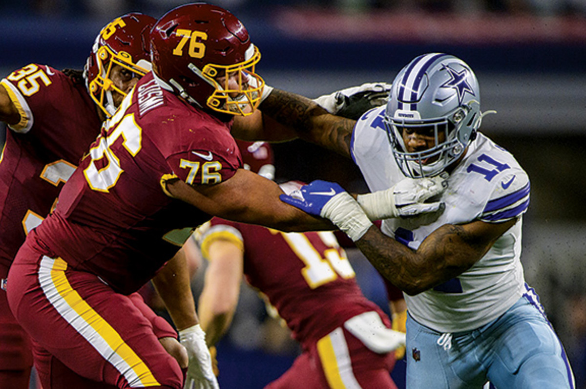Washington Football Team offensive tackle Sam Cosmi (76) and Dallas Cowboys outside linebacker Micah Parsons (11) in action during the game between the Washington Football Team and the Dallas Cowboys at AT&T Stadium.