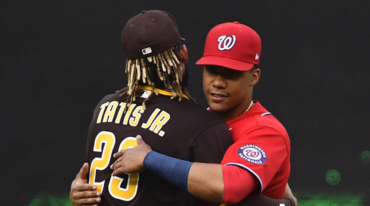 Washington Nationals left fielder Juan Soto (22) greets San Diego Padres shortstop Fernando Tatis Jr. (23) before a game at Nationals Park.