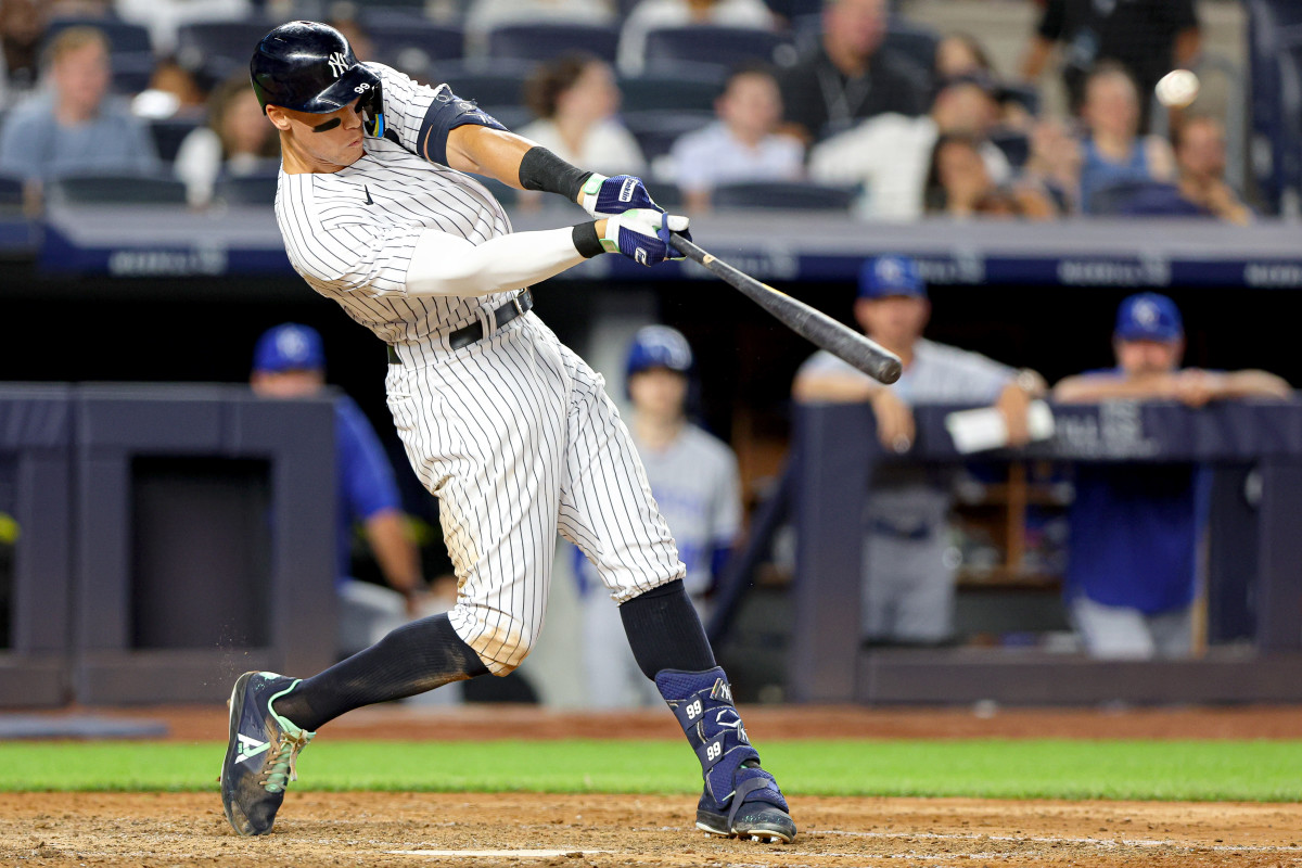 Jul 28, 2022; Bronx, New York, USA; New York Yankees center fielder Aaron Judge (99) hits a walk-off solo home run during the bottom of the ninth inning against the Kansas City Royals at Yankee Stadium.