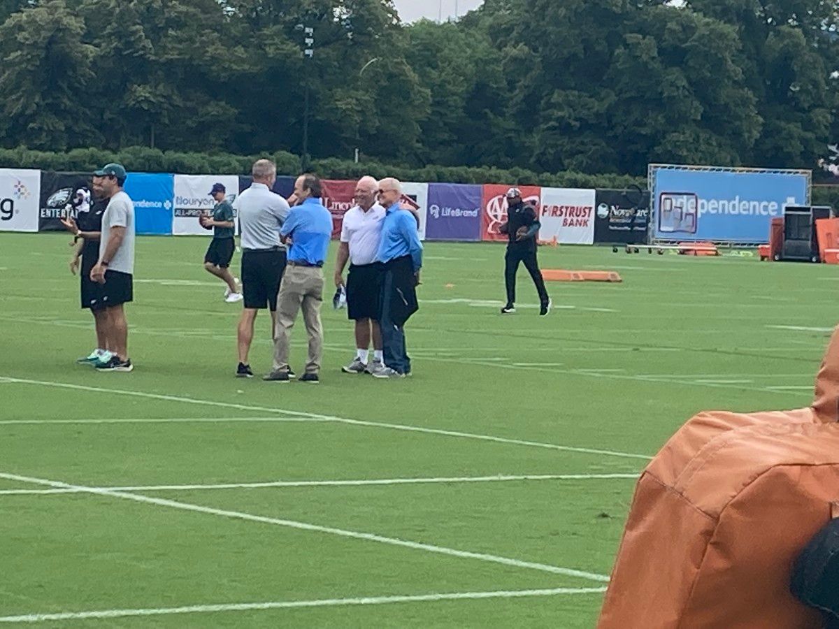 Jeffrey Lurie (white shirt) with Dick Vermeil during training camp practice on Aug. 1, 2022