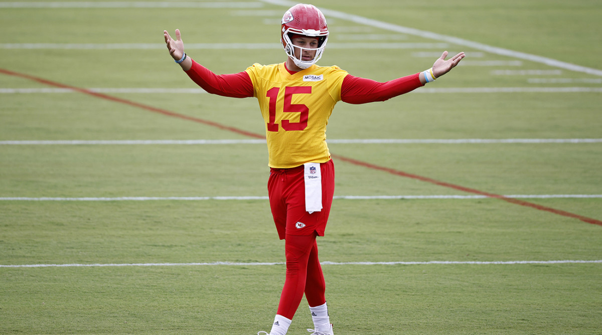 Chiefs quarterback Patrick Mahomes reacts during a morning workout at the team's NFL football training camp facility.