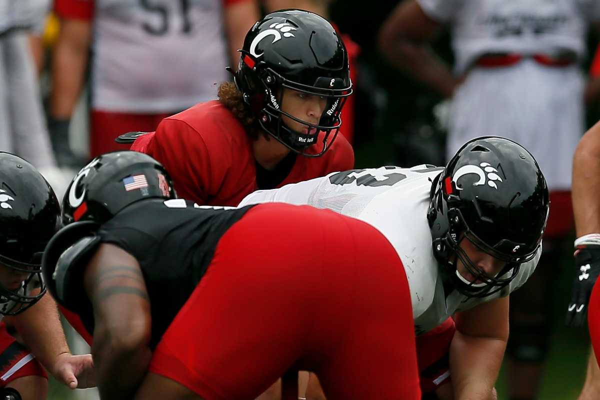 Cincinnati Bearcats quarterback Evan Prater (3) steps in under center during practice at the Higher Ground training facility in West Harrison, Ind., on Monday, Aug. 9, 2021. Cincinnati Bearcats Football Camp