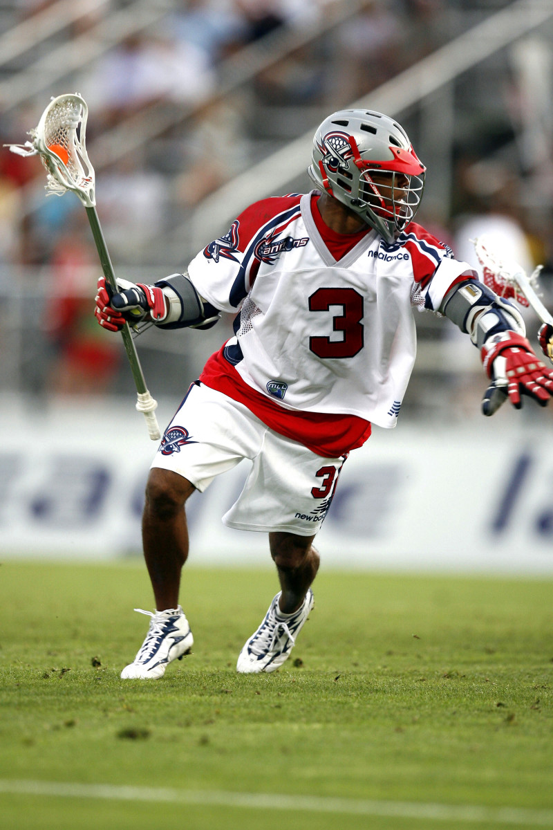 Boston Cannons attack Chazz Woodson (3) drives on goal during second half action against New Jersey Pride.