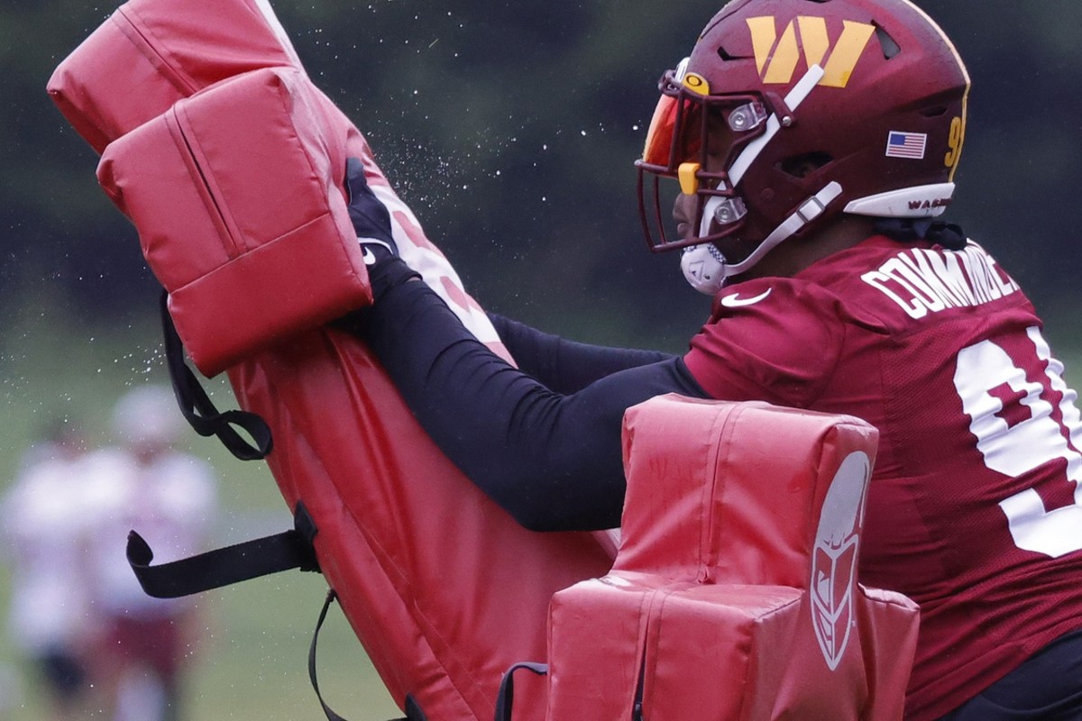 May 24, 2022; Asburn, VA, USA; Washington Commanders defensive tackle Daron Payne (94) works with a blocking dummy during drills as part of OTAs at The Park in Ashburn. Mandatory Credit: Geoff Burke-USA TODAY Sports
