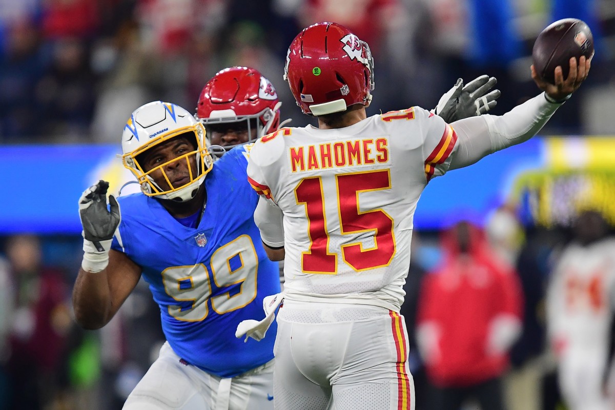 Dec 16, 2021; Inglewood, California, USA; Los Angeles Chargers defensive end Jerry Tillery (99) moves in against Kansas City Chiefs quarterback Patrick Mahomes (15) during the second half at SoFi Stadium. Mandatory Credit: Gary A. Vasquez-USA TODAY Sports