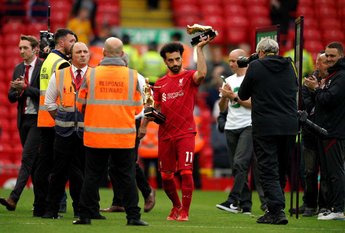 Mo Salah pictured lifting up his Golden Boot award after scoring the joint-most goals in the 2021/22 EPL season