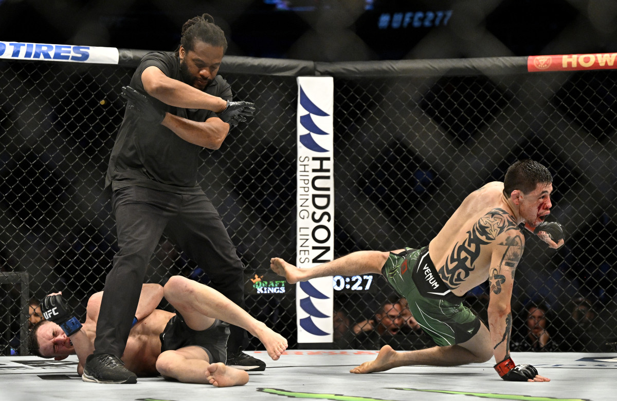 Brandon Moreno reacts after defeating Kai Kara-France in a flyweight interim title bout during UFC 277 at the American Airlines Center.