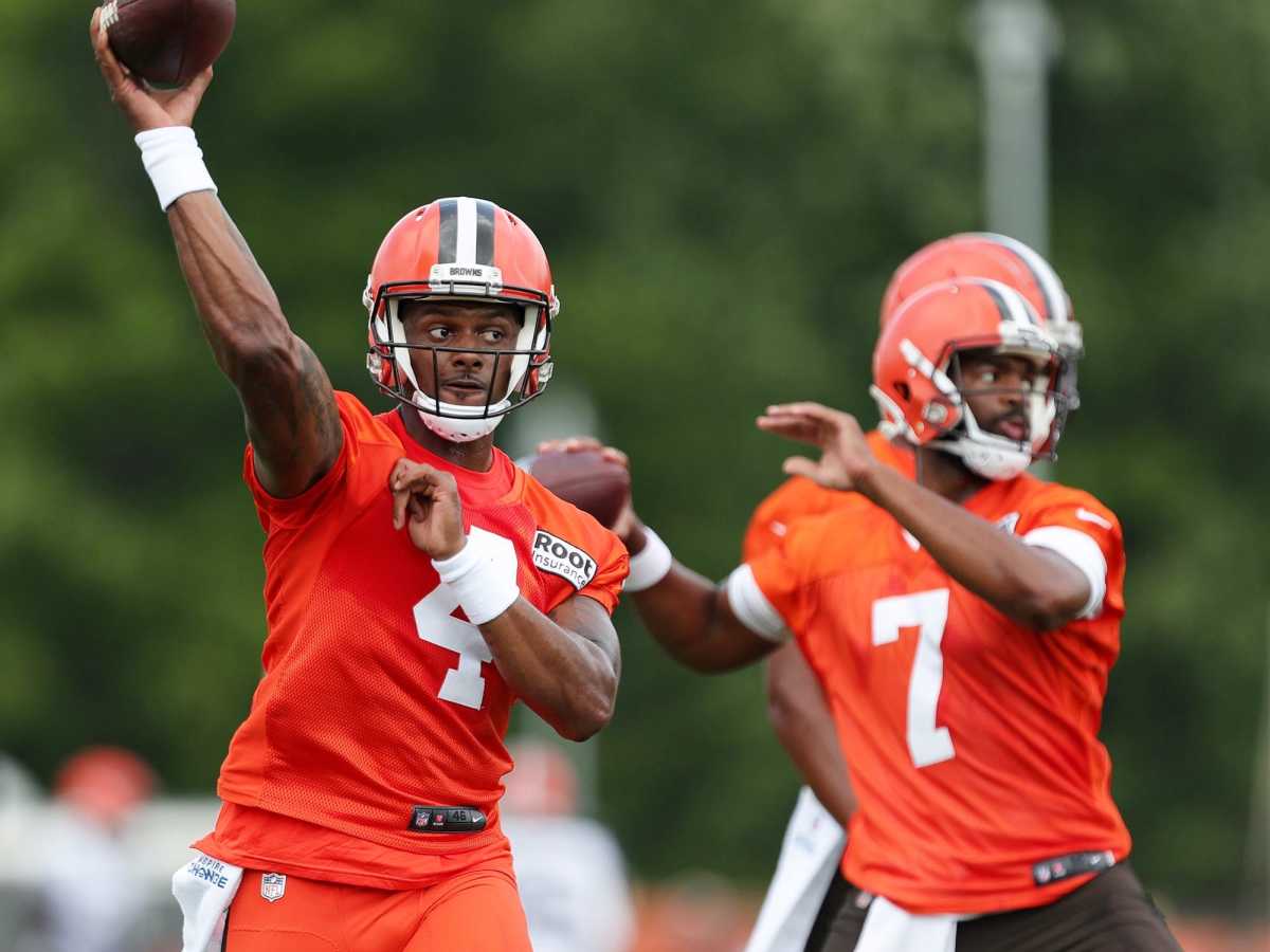 Cleveland Browns quarterback Deshaun Watson (left) throws with Jacoby Brissett during the team’s training camp.