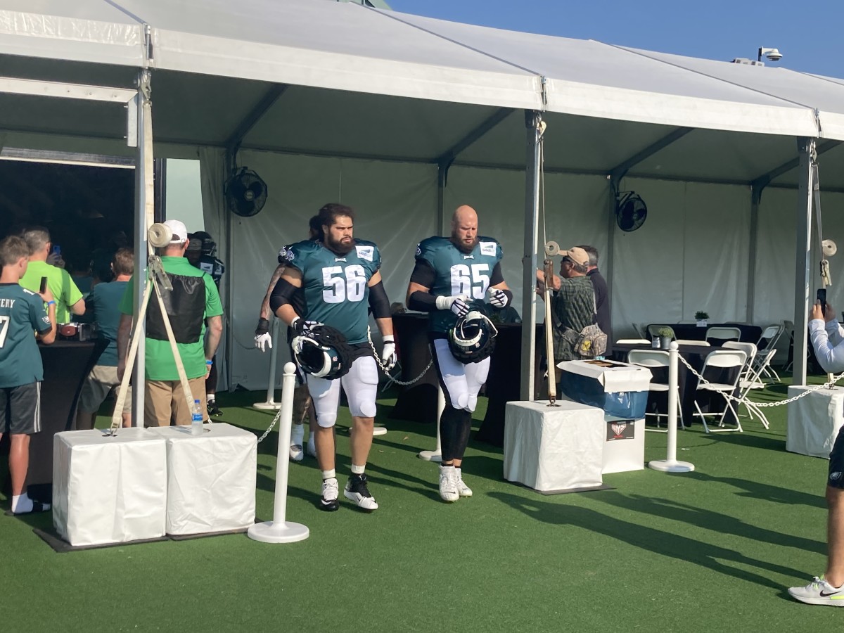 Isaac Seumalo (lef) and Lane Johnson take the practice field on Aug. 4, 2022