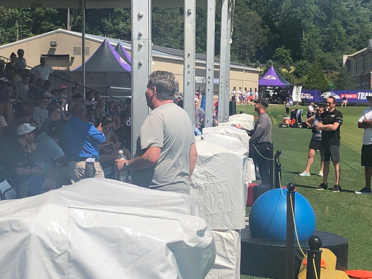 John Harbaugh meets with fans.
