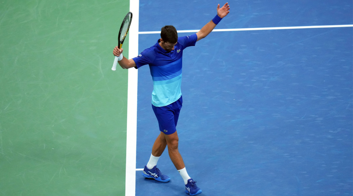 Novak Djokovic of Serbia reacts after winning a point in the third set against Jenson Brooksby of the United States on day eight of the 2021 U.S. Open tennis tournament.