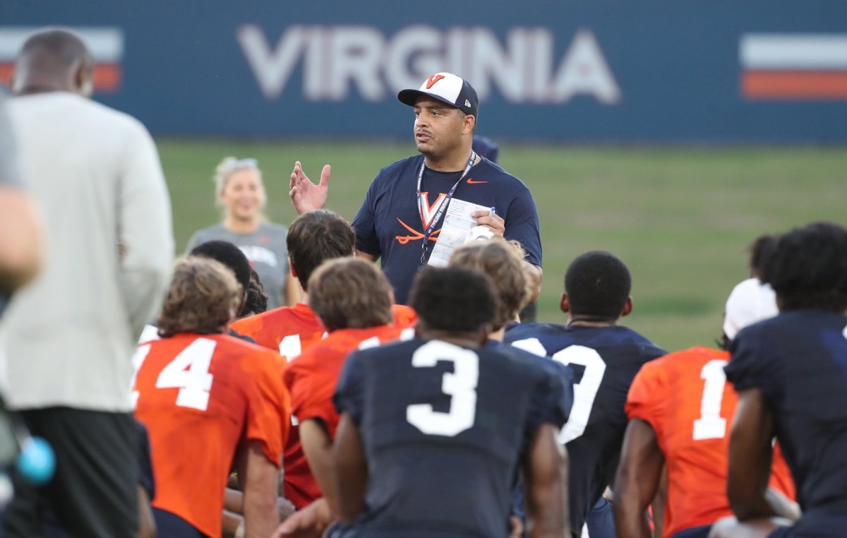 Virginia football head coach Tony Elliott addresses his team following the first day of fall practice.