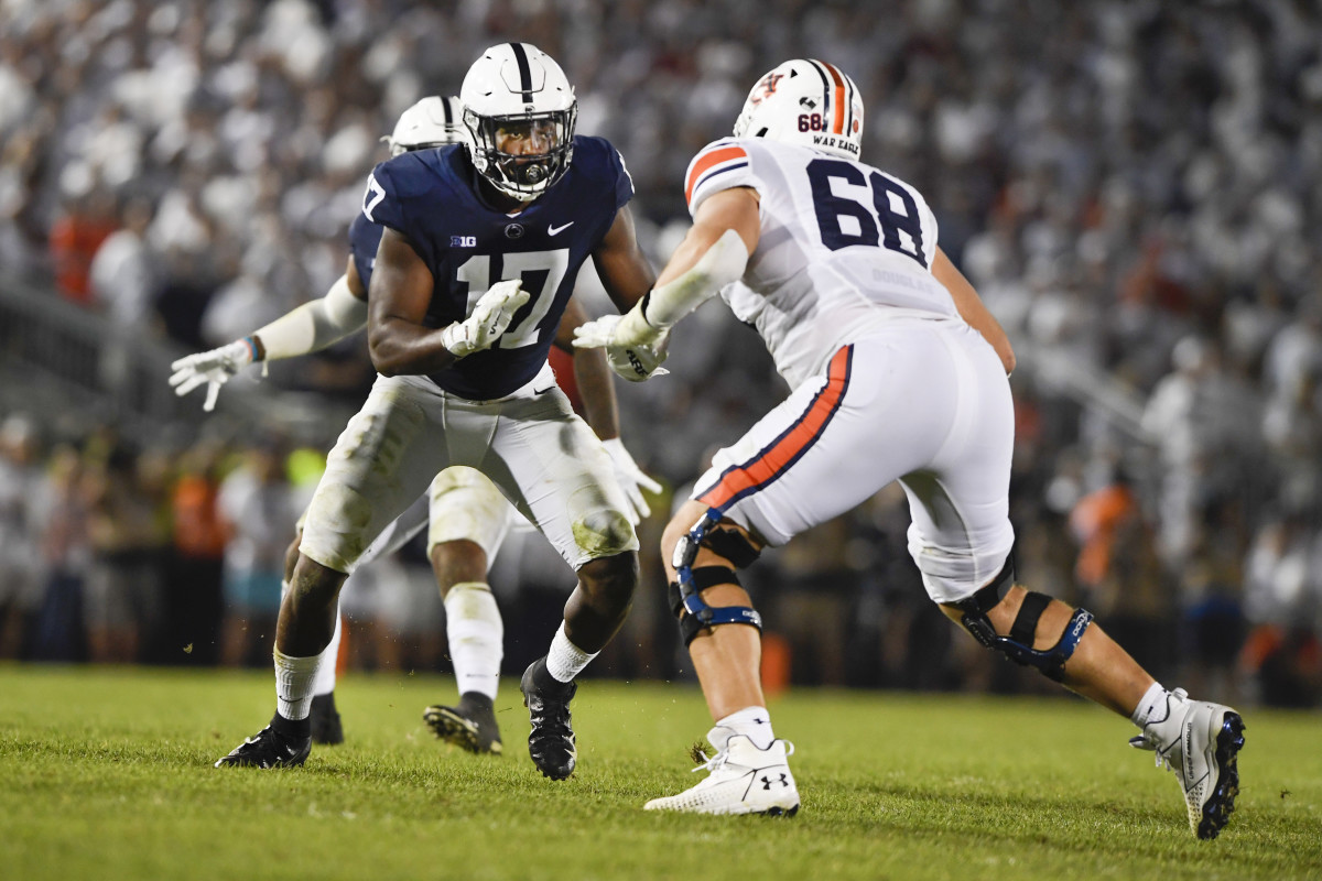 Penn State defensive end Arnold Ebiketie (17) rushes against Auburn offensive lineman Austin Troxell (68) during an NCAA college football game in State College, Pa., on Saturday, Sept.18, 2021. (AP Photo/Barry Reeger)