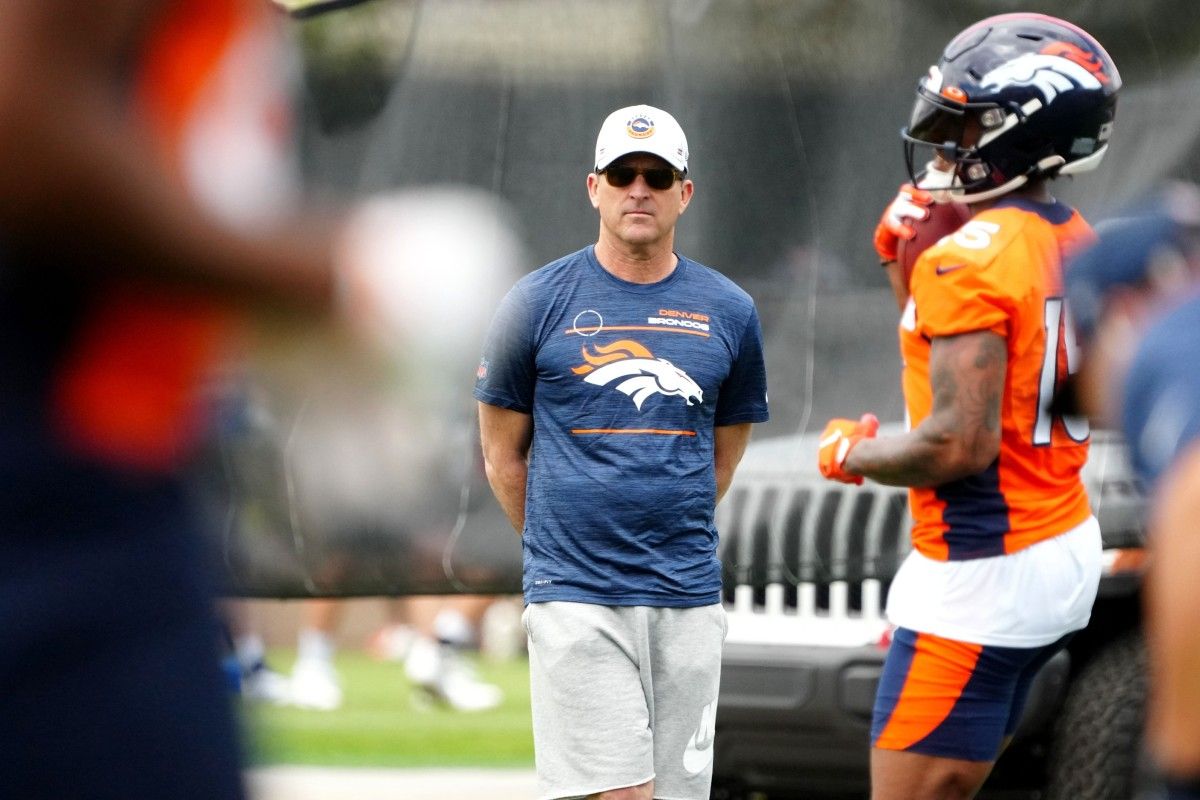 Denver Broncos general manager George Paton observes OTA workouts at the UC Health Training Center.