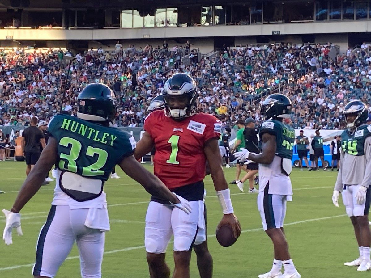 Jason Huntley and Jalen Hurts prepare for practice at the Linc