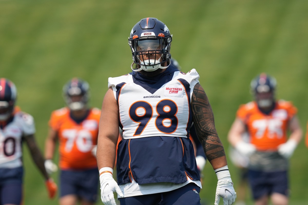 Denver Broncos defensive lineman Mike Purcell (98) during mini camp drills at the UCHealth Training Center.