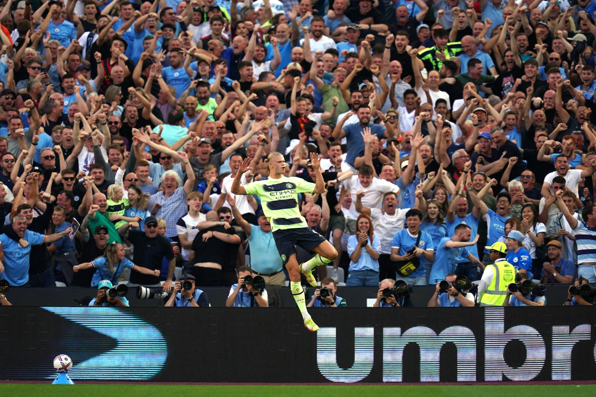 Erling Haaland pictured celebrating in front of Manchester City fans after scoring his second goal in a 2-0 win at West Ham in August 2022