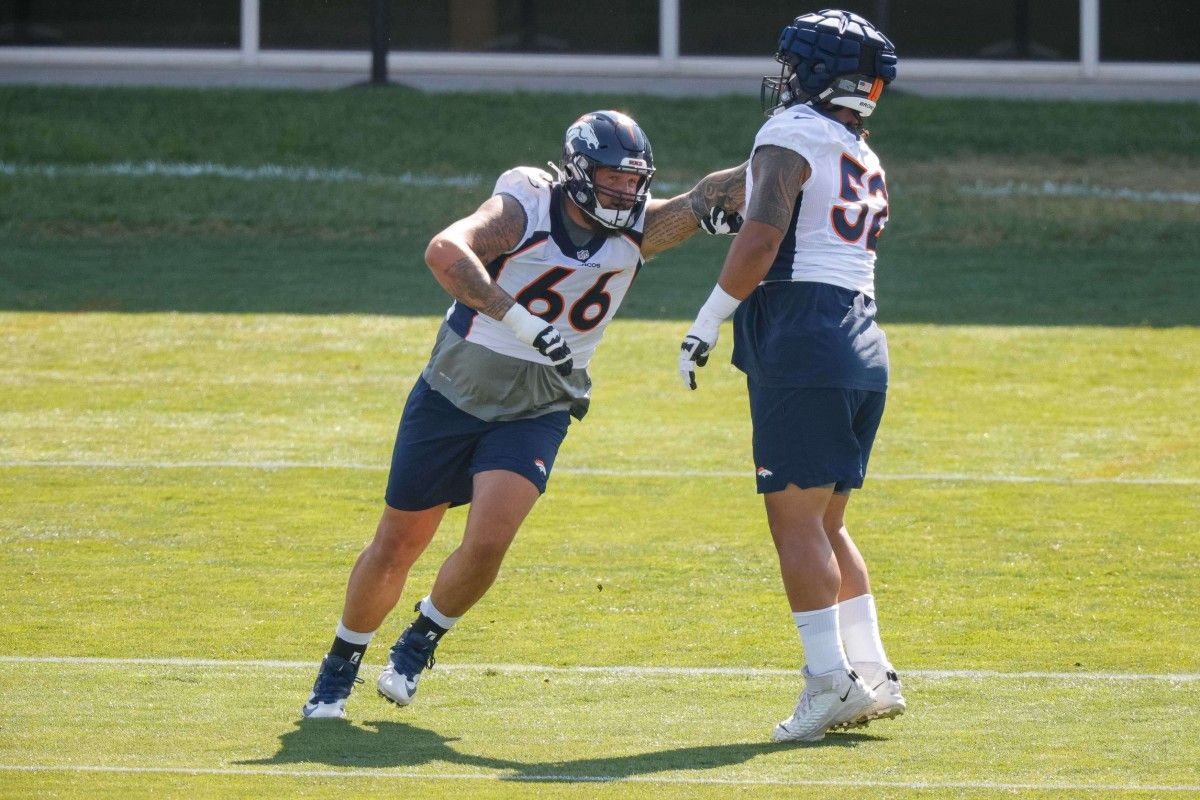 Denver Broncos guards Dalton Risner (66) and Netane Muti (52) during training camp at UCHealth Training Complex.
