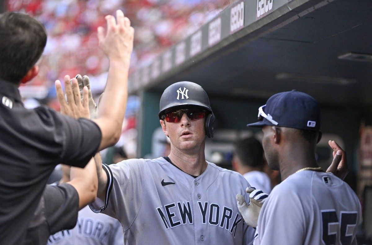 New York Yankees first baseman DJ LeMahieu (26) is congratulated by teammates after hitting a solo home run against the St. Louis Cardinals during the ninth inning at Busch Stadium. (Jeff Curry-USA TODAY Sports)